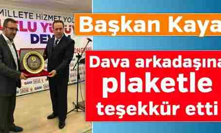 Kaya, Dava Arkadaşına Plaketle Teşekkür Etti